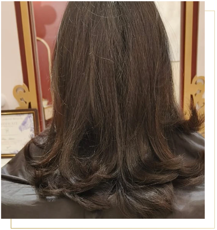 Skilled hairdresser in Gurgaon performing a stylish haircut at a luxury hair salon